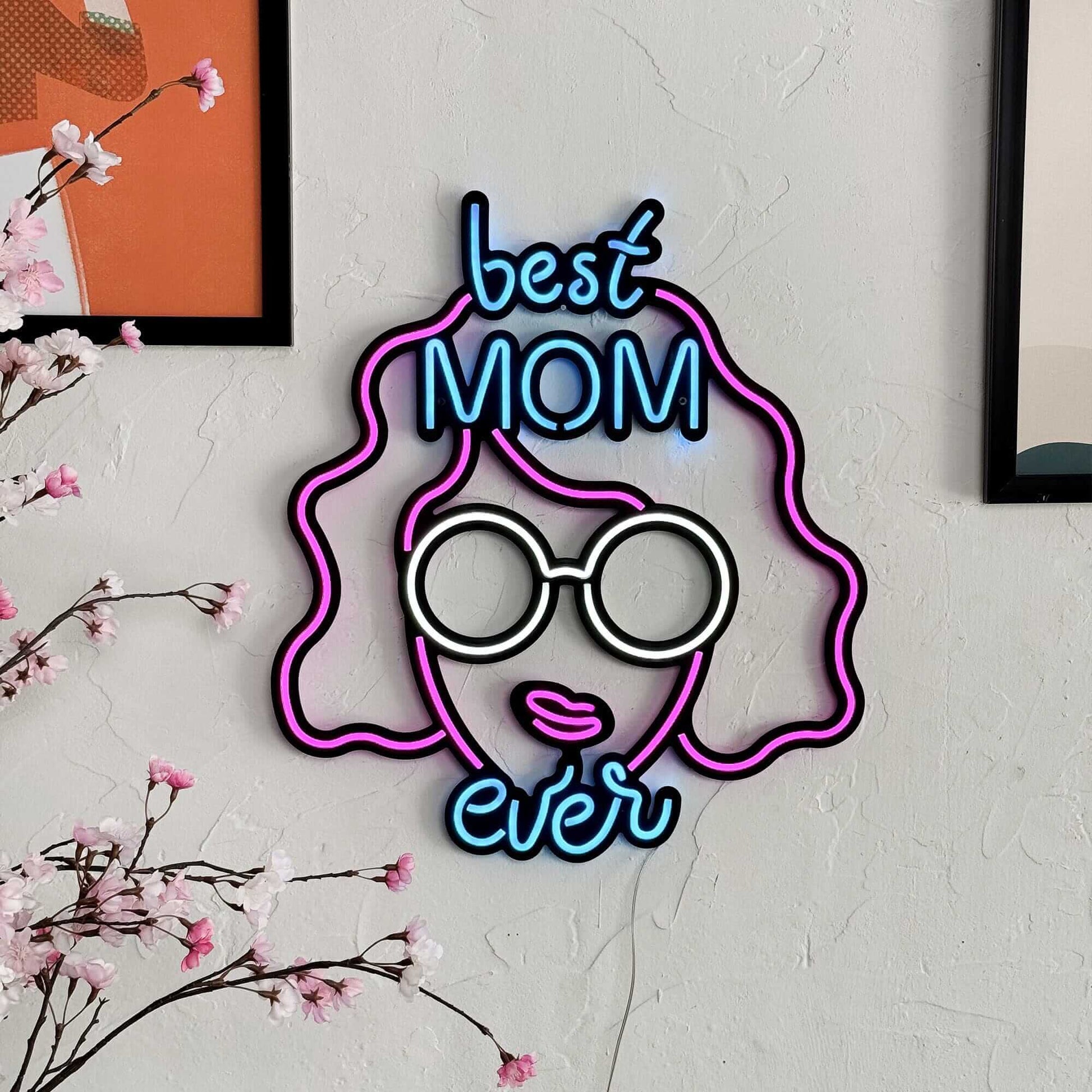 Best Mom Ever - Neon Signs Neon Wall Art | SKU: NEO-090 | Available at Decojuana | Tags: metal neon wall decor,Metal Neon Wall Letter,motivational neon quotes,Neon Artwork,Neon motivational quotes,neon party wall decor,neon quotes,Neon Signs,neon wall art